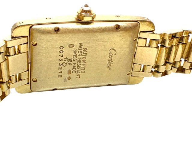 Cartier, montre Tank américaine en or jaune et diamants - Maison Eloe