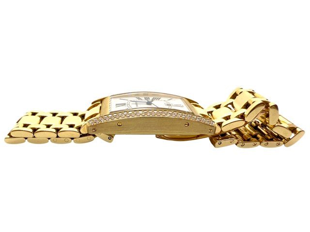 Cartier, montre Tank américaine en or jaune et diamants - Maison Eloe