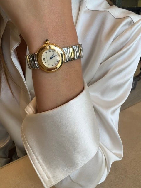 Cartier "Colisée" watch, yellow gold, steel.