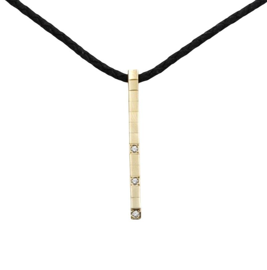 Cartier, pendentif collection "Lanières", en or jaune et diamants