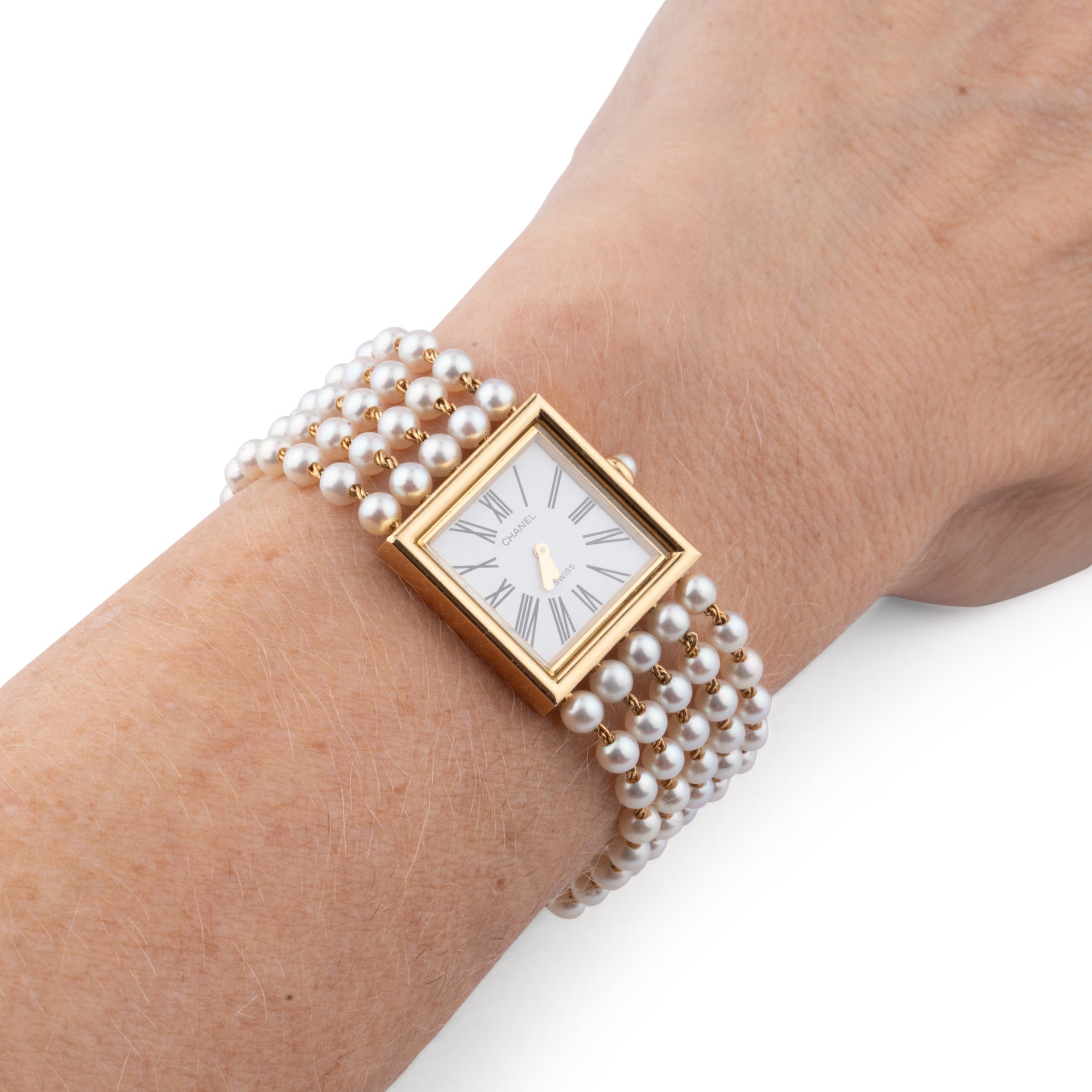 Chanel, montre "Mademoiselle" vintage en perles sur or jaune 18K