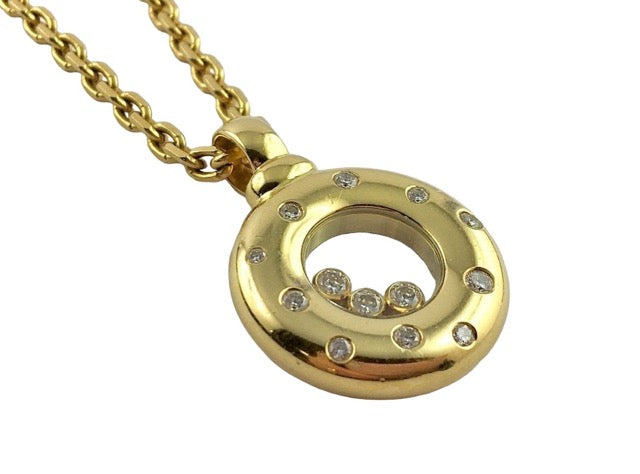 Chopard, "Happy Diamonds" pendant in 18K yellow gold and diamonds