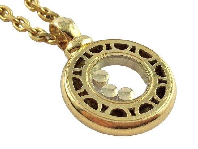 Chopard, "Happy Diamonds" pendant in 18K yellow gold and diamonds