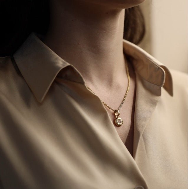 Chopard collier pendentif "Happy Diamonds" en or jaune et diamants - Maison Eloe