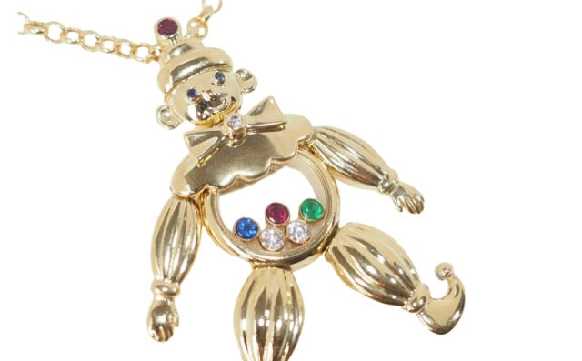 Chopard, "Happy Clown" pendant in yellow gold and moving diamonds