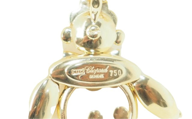 Chopard, "Happy Clown" pendant in yellow gold and moving diamonds