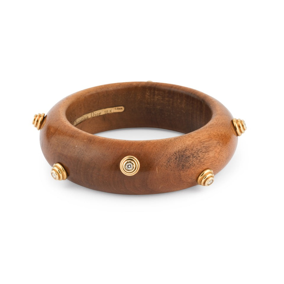 Christian Dior bracelet in yellow gold, wood and diamonds.