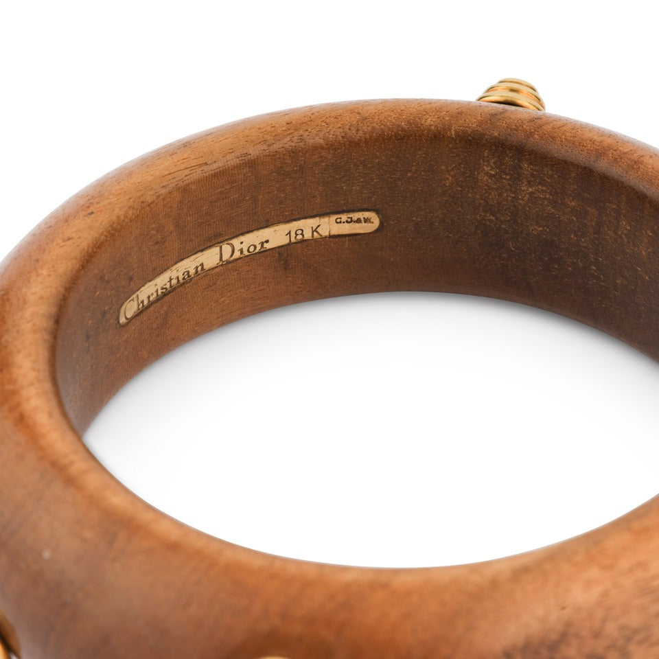 Christian Dior bracelet in yellow gold, wood and diamonds.