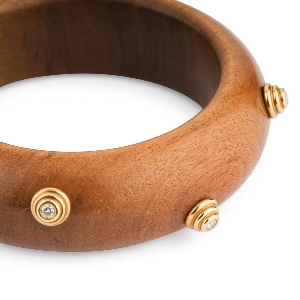 Christian Dior bracelet in yellow gold, wood and diamonds.