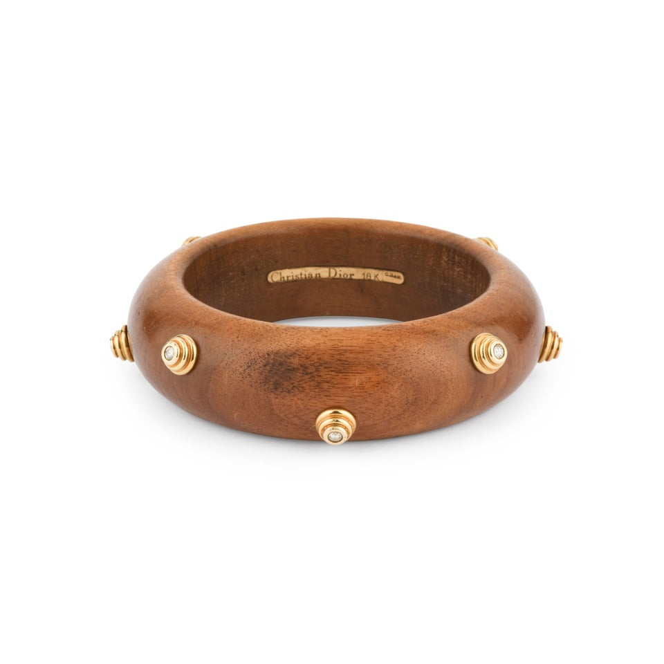 Christian Dior bracelet in yellow gold, wood and diamonds.