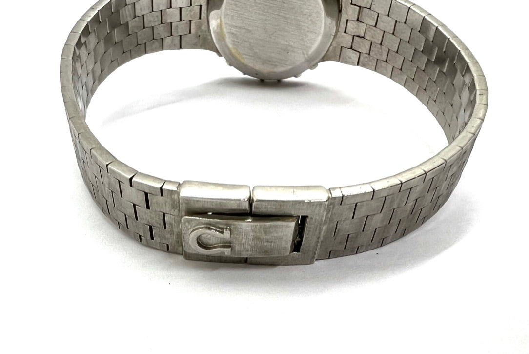 A white gold and diamond Omega lady's watch