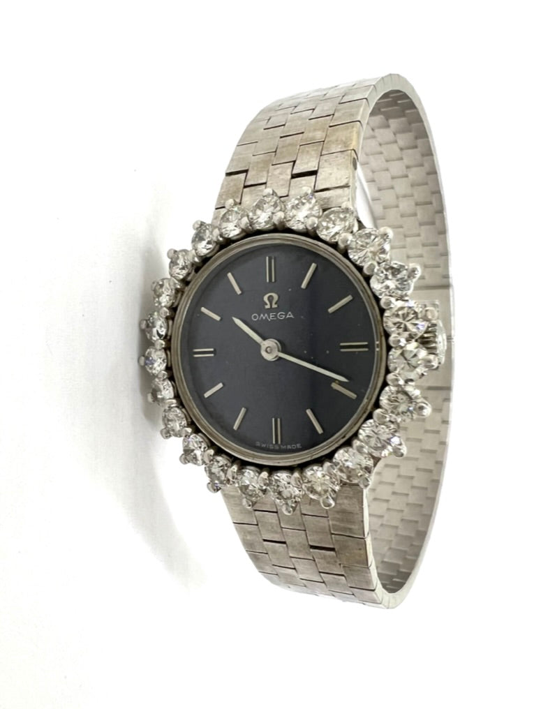Une montre de Dame Omega or blanc et Diamants