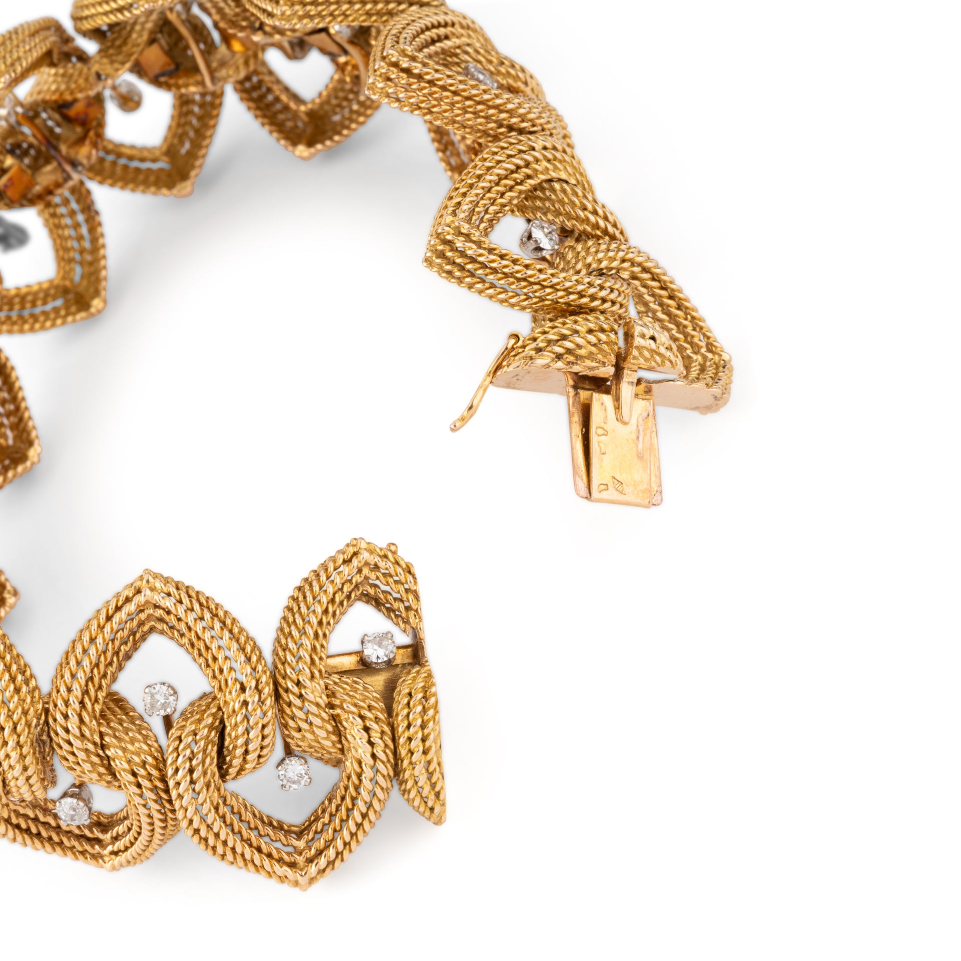 Espezel, Articulated gold cord bracelet with diamonds