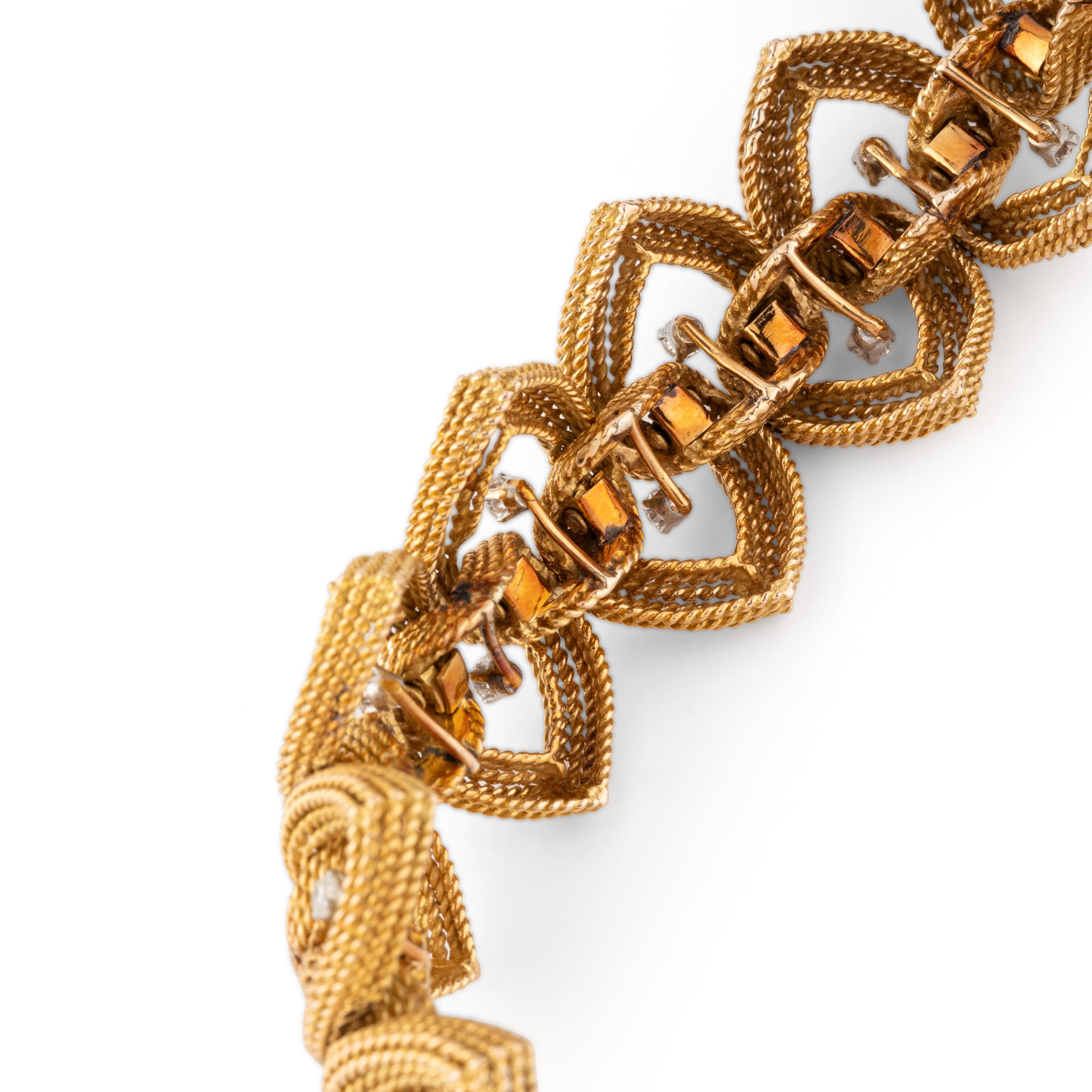Espezel, Articulated gold cord bracelet with diamonds