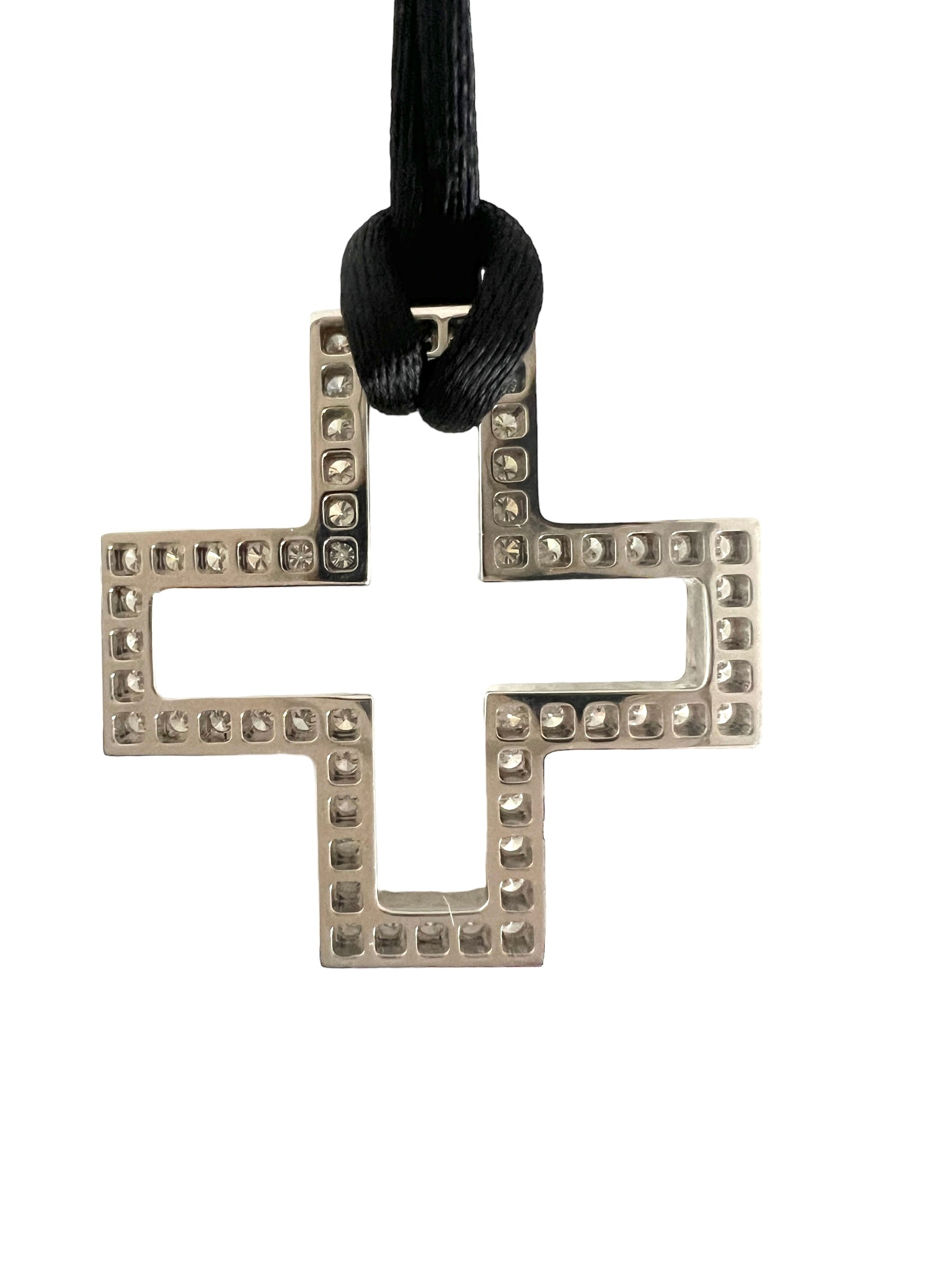 Gucci, Gold and diamond cross pendant on black satin strap