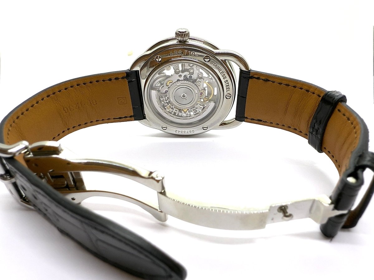 Hermès montre "Arceau" squelette en acier sur cuir Neuve full set - Maison Eloe