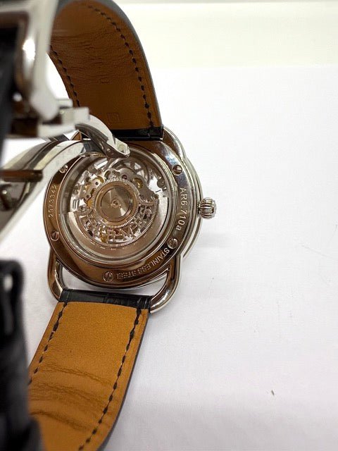 Hermès montre "Arceau" squelette en acier sur cuir Neuve full set - Maison Eloe
