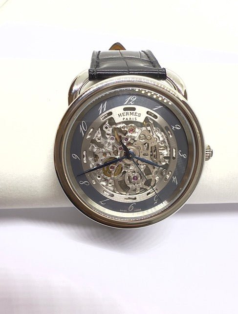 Hermès montre "Arceau" squelette en acier sur cuir Neuve full set - Maison Eloe