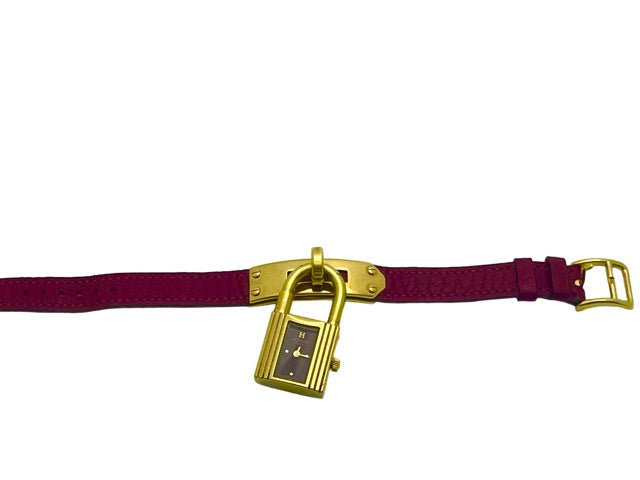 Hermès, Kelly gold-plated watch, burgundy dial