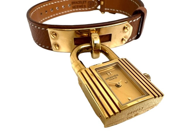 Hermès Kelly watch on gold leather strap