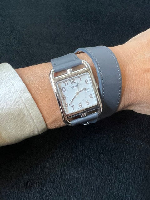 Hermès, "Cape Cod" watch in steel on a long leather strap