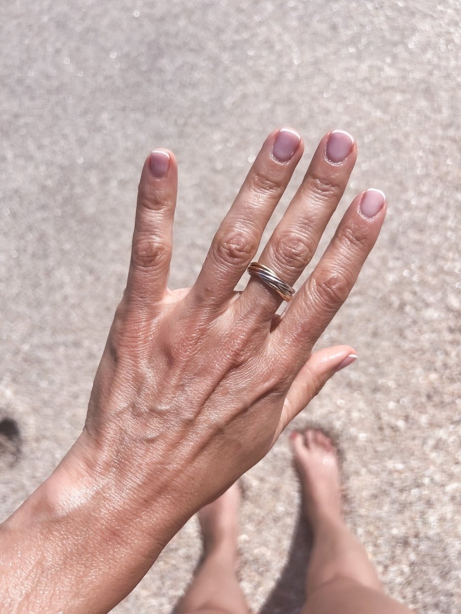 Bague Alliance Trinity 7 anneaux de la maison Cartier - Maison Eloe