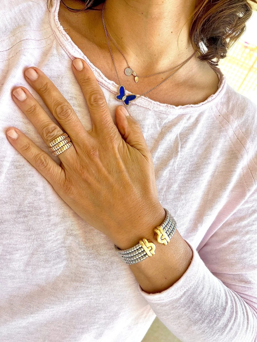 Bracelet de la Maison Bvlgari,collection Parentesi en acier et or jaune - Maison Eloe