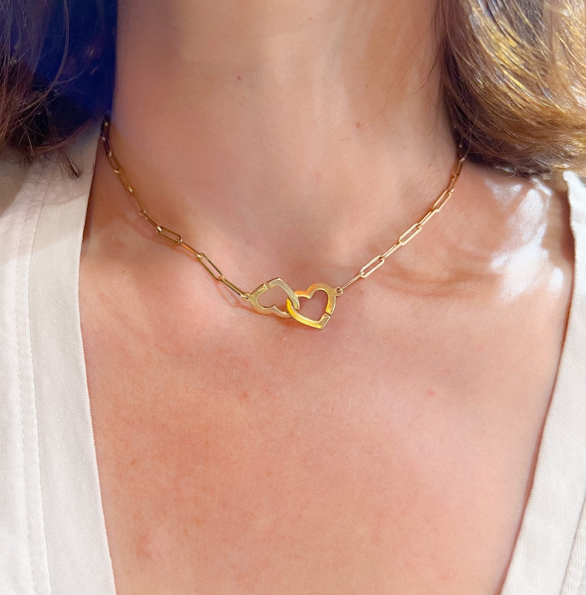 Dinh Van rose gold necklace forming 2 hearts