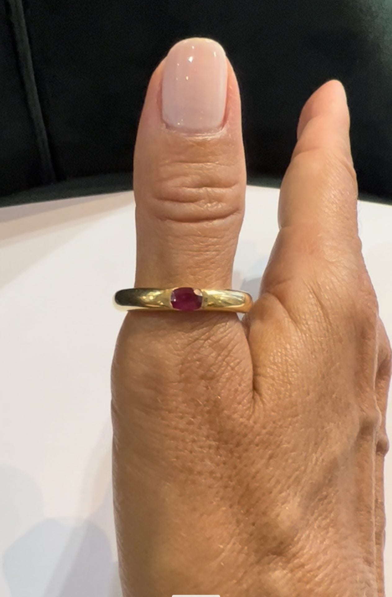A Cartier yellow gold and ruby "Elipse" model ring