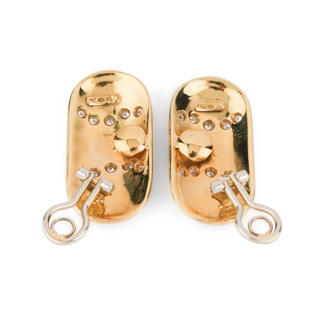 A pair of clip-on earrings from Illario in yellow gold, enamel and diamonds.