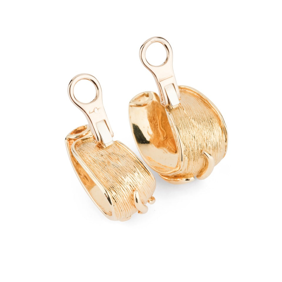A pair of Kutchinsky clip-on earrings in 18K yellow gold
