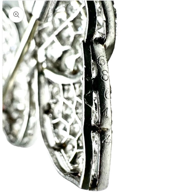 Lacloche Frères "Knot" brooch in platinum and diamonds