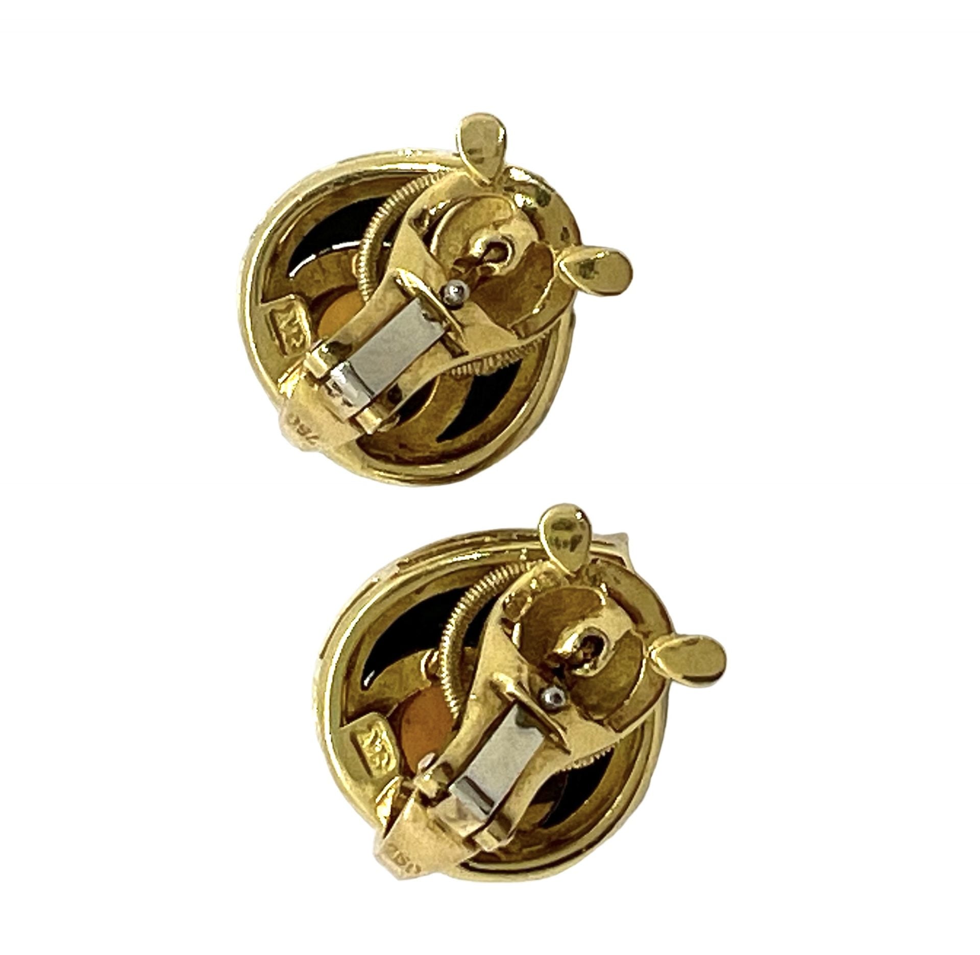 Clip-on earrings by Marina B