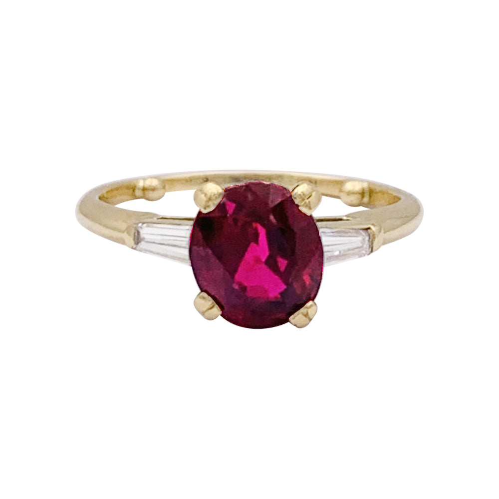 Bague Boucheron or jaune, diamants et rubis.