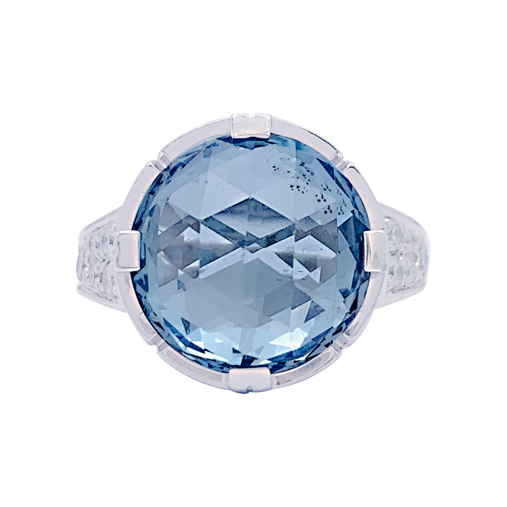 Bague Bulgari "Parentesi Cocktail" en or blanc, topaze bleue et diamants.