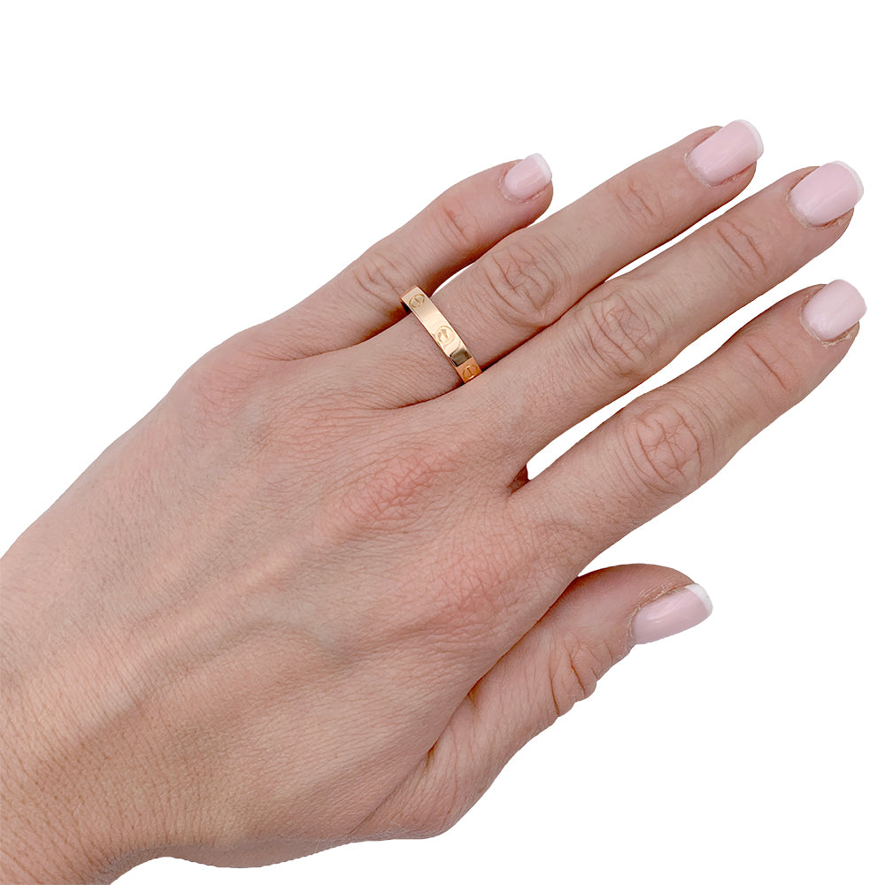 Bague Cartier, "Alliance Love", or rose.
