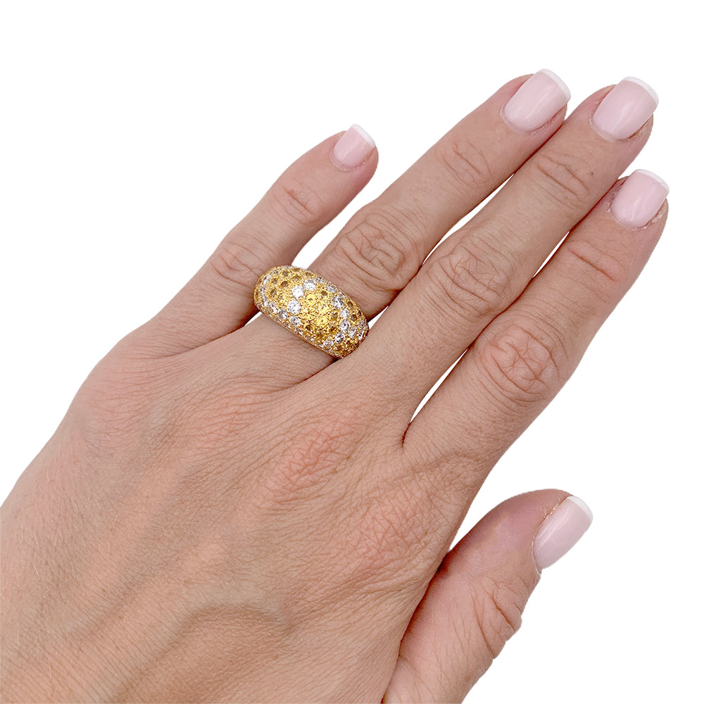 Cartier ring, "Sauvage", in yellow gold, diamonds, yellow sapphires.