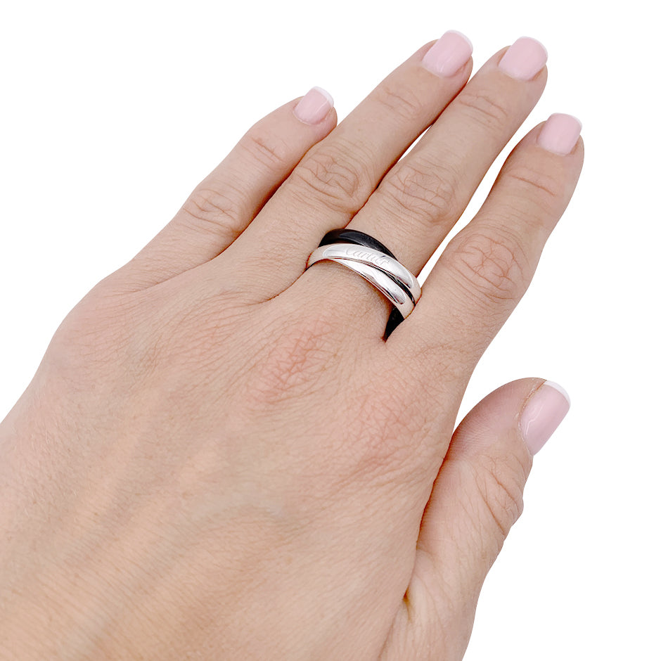 Bague Cartier, "Trinity", or blanc et céramique noire.