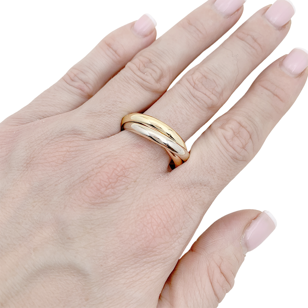 Bague Cartier "Trinity" trois ors.