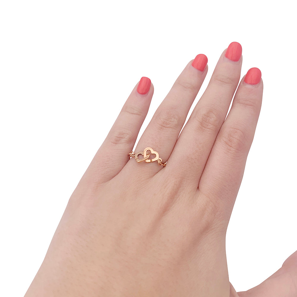 Dinh Van ring, "Doubles Coeur" rose gold.