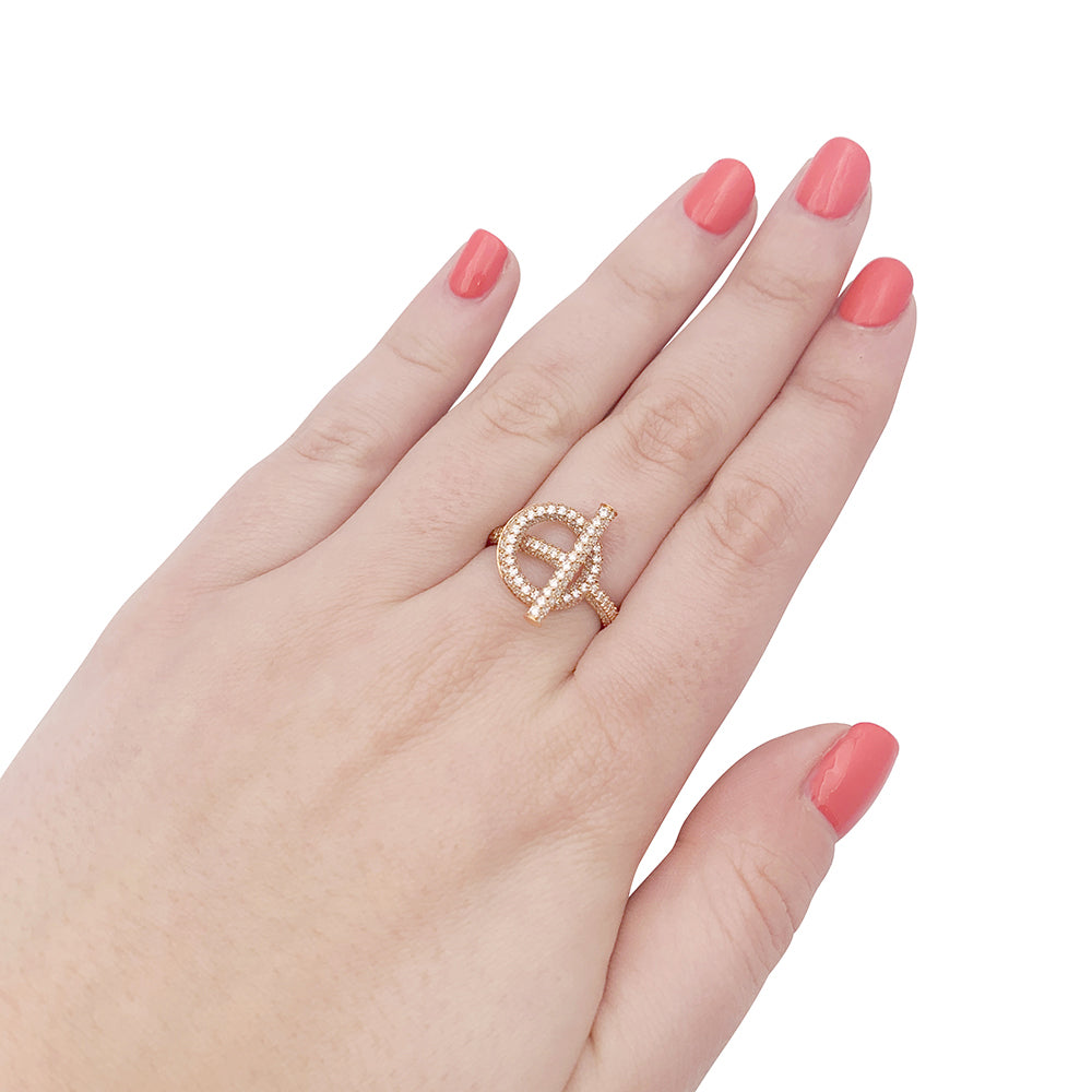 Hermès "Echappée Hermès" ring in pink gold and diamonds.