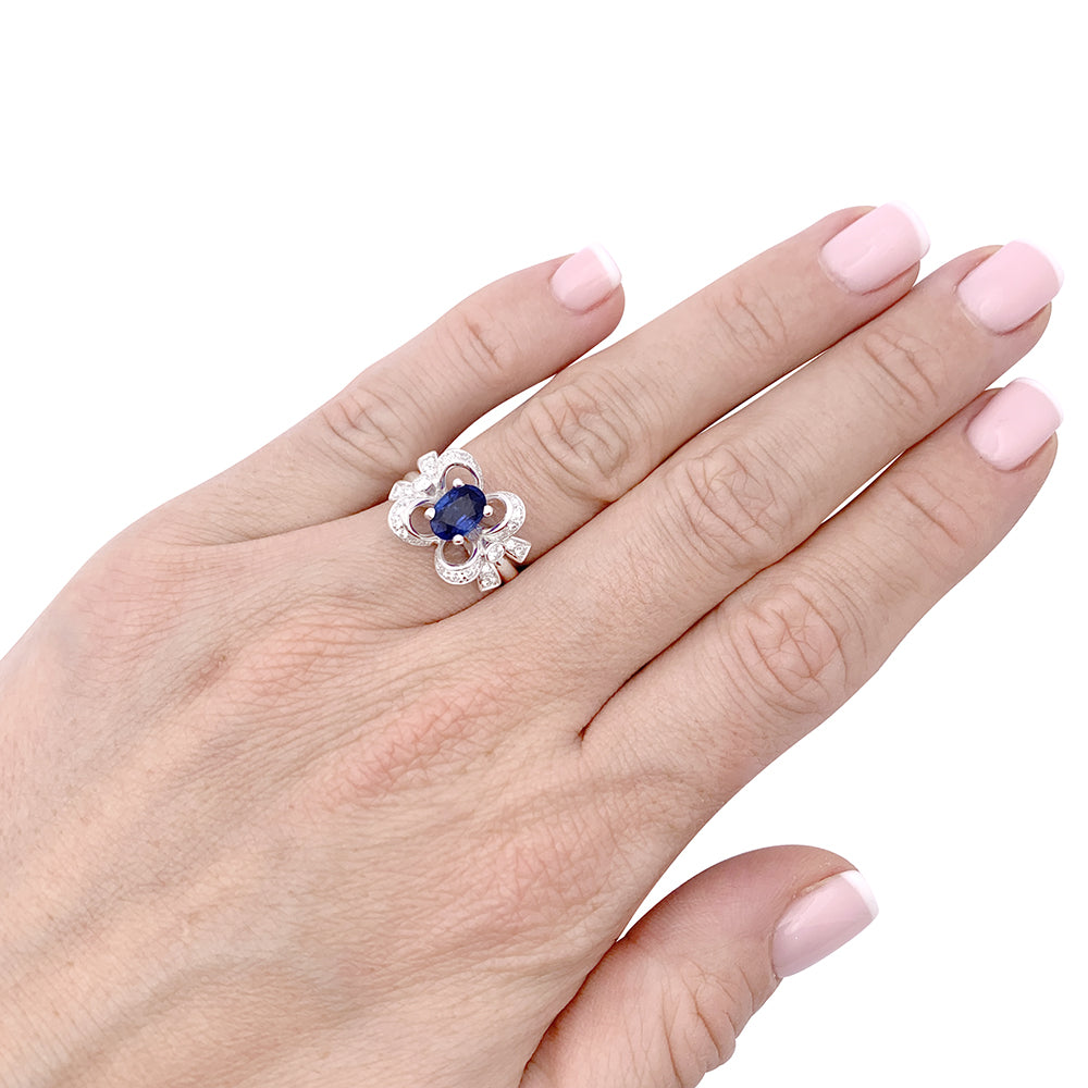 Bague Mellerio "Reine de Coeur Désirée" or blanc, diamants, saphir.