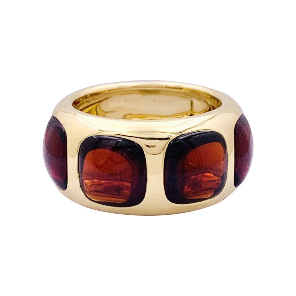 Bague Pomellato "Bisanzio" or jaune, grenats.