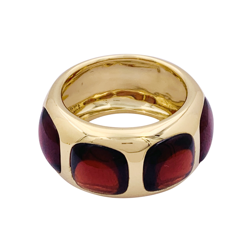 Bague Pomellato "Bisanzio" or jaune, grenats.