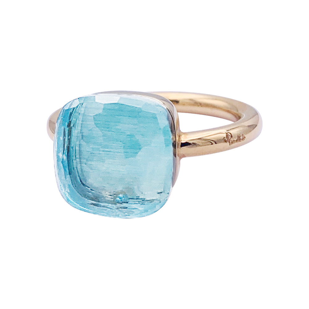 Bague Pomellato, "Nudo Maxi", deux ors et topaze bleue.