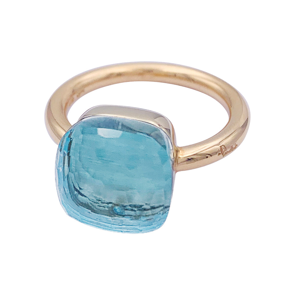 Bague Pomellato, "Nudo Maxi", deux ors et topaze bleue.