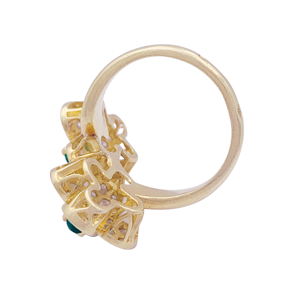 Van Cleef & Arpels ring, "Fleurette", in yellow gold, diamonds and emeralds.