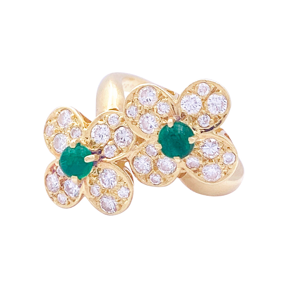 Van Cleef & Arpels ring, "Fleurette", in yellow gold, diamonds and emeralds.