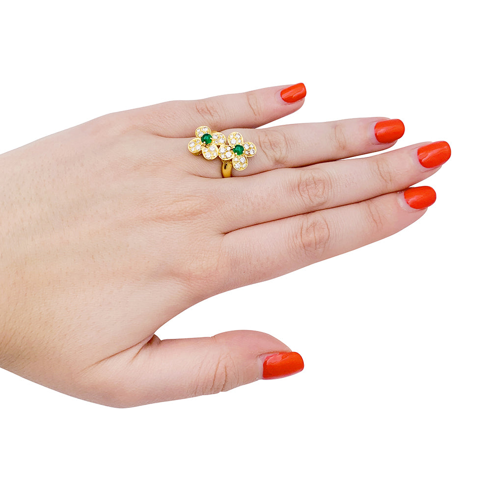 Van Cleef & Arpels ring, "Fleurette", in yellow gold, diamonds and emeralds.