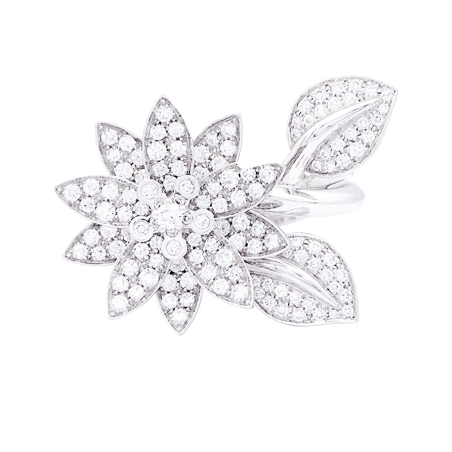 Van Cleef & Arpels "Lotus" ring in white gold and diamonds.